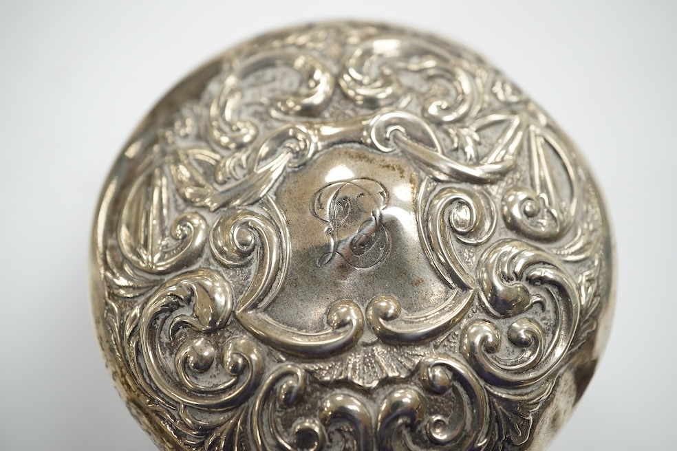A George V repousse silver dressing table tray, William Neale Ltd, Birmingham, 1910, 29.1cm, two silver cigarette cases, a George III silver christening mug (a.f.) and four silver mounted glass toilet jars. Condition - p